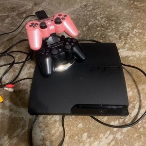 Sony PS3 Console with Pink and Black Controllers
